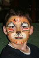 Maquillage tigre lors d'un arbre de noel d'un comit d'entreprise